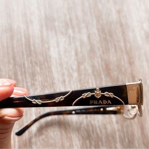 Gold and tortoise shell Prada eyeglasses